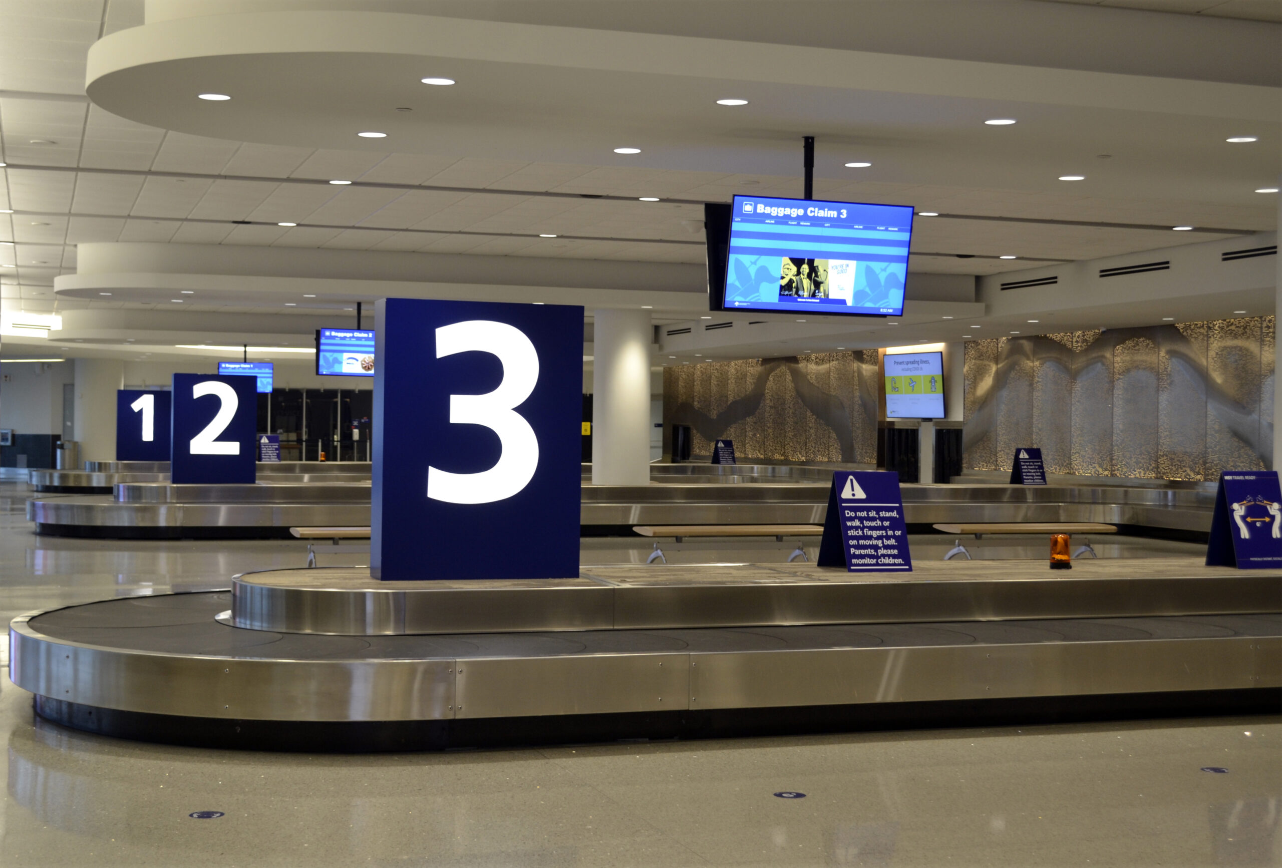 Baggage belts labeled 3, 2, and 1