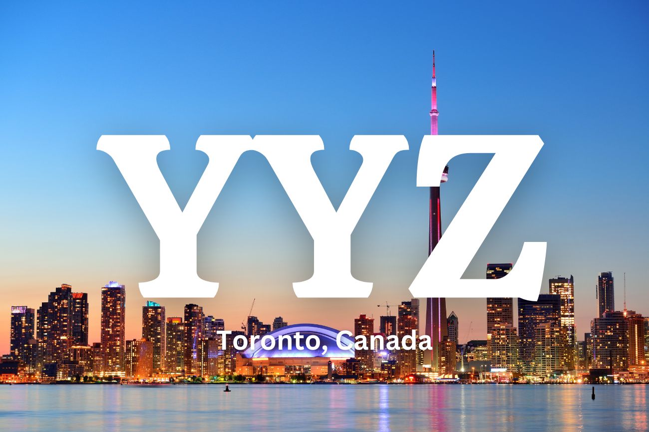 Text: YYZ Toronto, Canada with the Toronto skyline lit up in the background