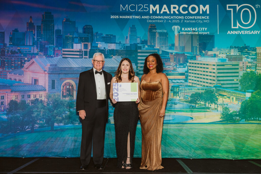 Pictured Left to Right: Kevin M. Burke, CEO of Airports Council International- North America ( ACI-NA), Keely Herrington, Senior Marketing Coordinator of New Orleans Aviation Board, Erin Burns, Deputy Director of Aviation for Customer Experience, Marketing, and Communications