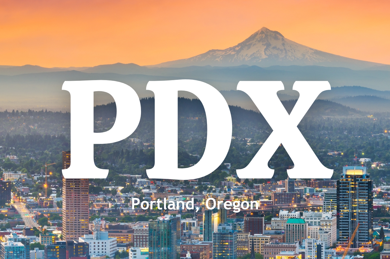 Text: YYZ Toronto, Canada with the Toronto skyline lit up in the background