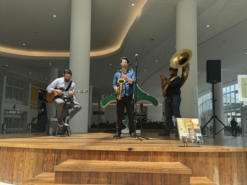 The Tangiers Combo performing at the Louis Armstrong New Orleans International Airport on the Jazz Garden Stage.